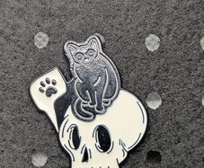 Cute cat and skull enamel pin