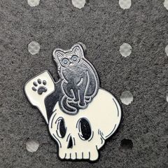 Cute cat and skull enamel pin