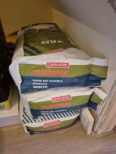 3 bags of Evo-Stik Platinum Rapid-Set Flexible Tile Adhesive White 20kg.