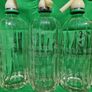 6 Antique Soda Bottles and Crate Image 6