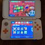 Nintendo New 2DS XL White and Orange Image 5