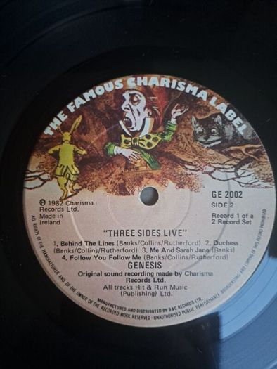 Genesis three sides live . Irish press on The famous Charisma label No sleeve . record 1 of a 2 record set