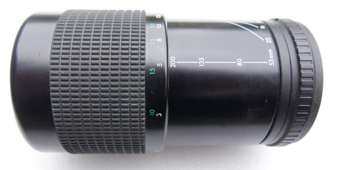 Pentacon Prakticar PB 4-5.6/55-200 MC is a vintage manual focus zoom lens made in East Germany