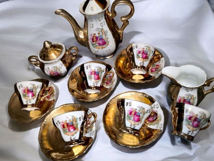 Antique gold demittase set