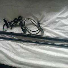 FREE 2 x curtain poles + brackets