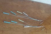 Silver tone chain earrings.