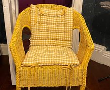Wicker chair with cushions