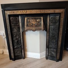 Cast iron fireplace insert