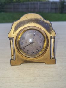 Antique brass desk clock