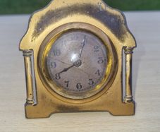 Antique brass desk clock