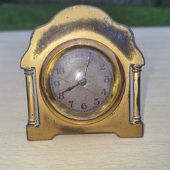 Antique brass desk clock