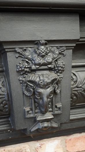 Ram-Head Wrought Iron Fireplace Surround with Timber Mantel