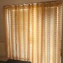 Set of 8 Mustard Pom Pom Voile Eyelet Curtains Image 3