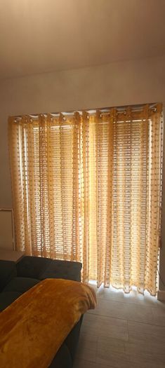 Set of 8 Mustard Pom Pom Voile Eyelet Curtains