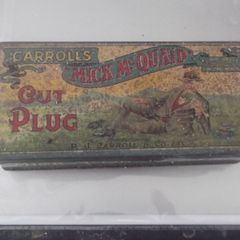 a antique mick mc quaid tin