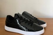Girls Puma black patent  trainers size 2/34.5