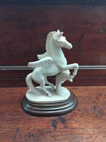 Pegasus Statue on wood