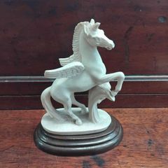 Pegasus Statue on wood