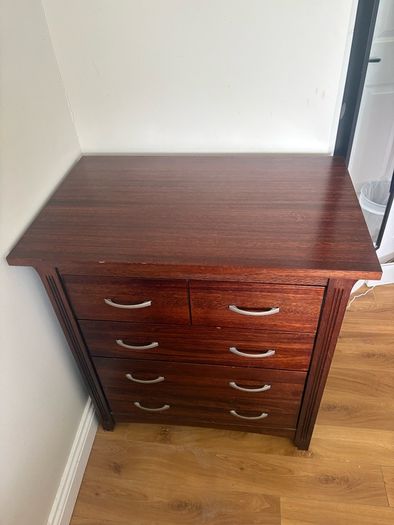 Dark wood chest of drawers and matching locker