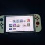 nintendo switch (1) oled with 14 virtual games Image 3