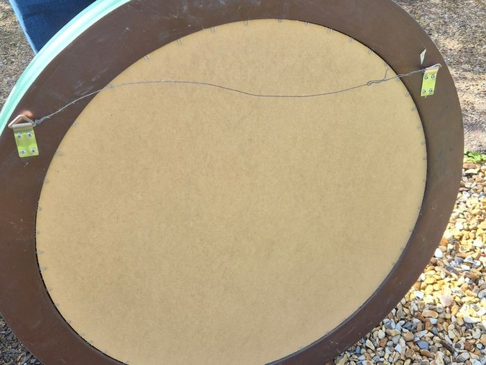 Round mirror called "witch's eye" in Napoleon III style, also "butler's mirror"