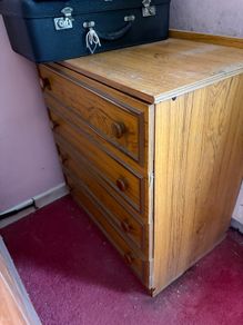 4 drawer chest of drawers with wood effect finish and original handles.
