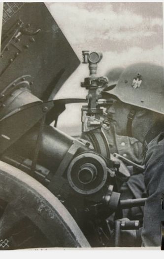 Ww2 artillery sight flak 88 and traversing crank for the German flak