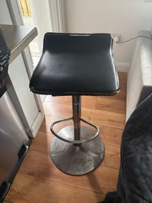2 black bar stools