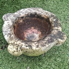 Vintage weathered stone bird bath
