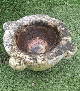 Vintage weathered stone bird bath