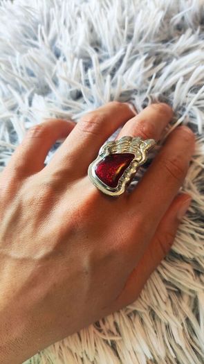 Unique design ring with a red angel wing stone