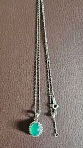 Silver pendant with jade necklace