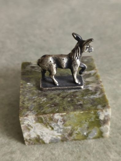 Donkey/mule figure on GREEN Connemara marble plate .