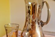 Gold painted glass Pitcher and glass.