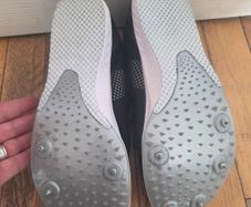 Athletic spike shoes, size uk 5.5.And bag