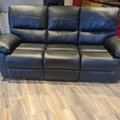 Black leather reclining couch