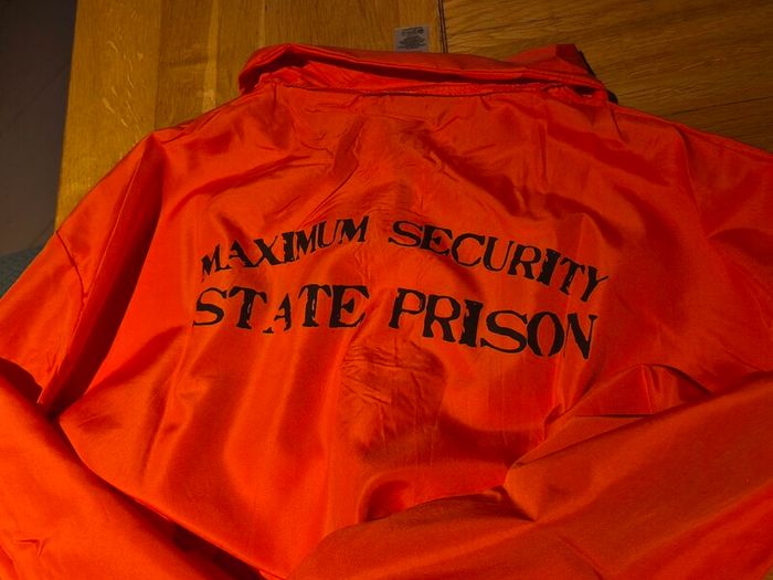 Prisoner Costume with handcuffs and fake tattoos