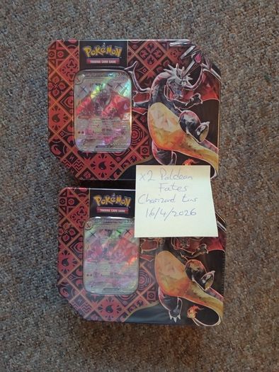 Pokemon TCG Scarlet and Violet Paldean Fates Charizard ex Tins