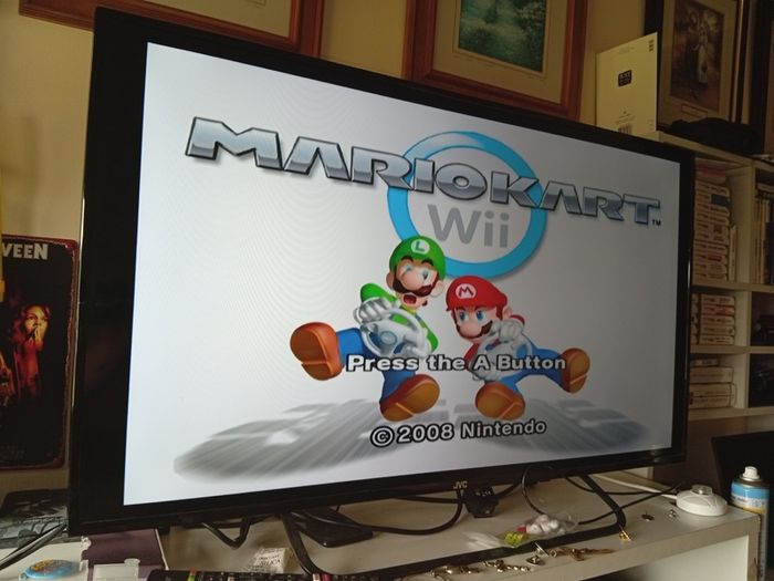 Nintendo Wii Controller Nunchuk With Mario Kart And Others All In Working Order