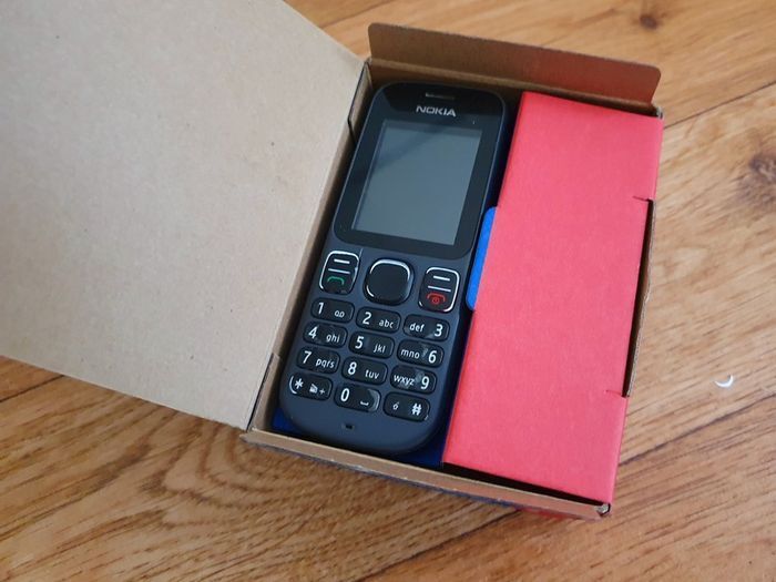 Nokia 100 - Boxed, Charger & Earphones - Excellent Condition