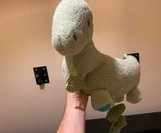 Green dinosaur soft toy teddy