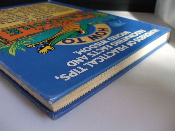 SALE!  HOW TO HOLD A CROCODILE - Hundreds Of Practical Tips, Fascinating Facts And Wicked Wisdom