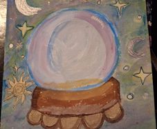 Hand painted celestial crystal ball.