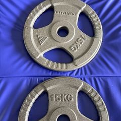 Two 15kg unused weights (like new)