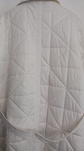 Capsule White Quilted Longline Coat.