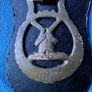 Vintage horse brasses on leather strap Image 7