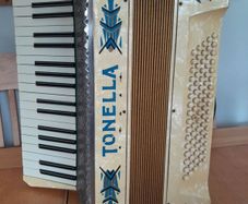 Vintage 1950's Tonella 34-Key/80-Bass Piano Accordion. With Case, Music books and sheet music.