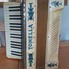 Vintage 1950's Tonella 34-Key/80-Bass Piano Accordion. With Case, Music books and sheet music.