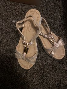 Sandals Size 39/6 brand new light gold colour .