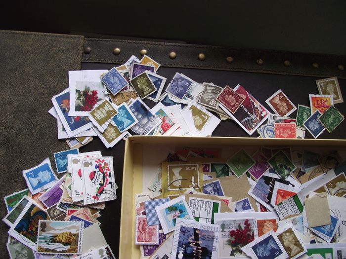 A box with collection of stamps from Great Britain
